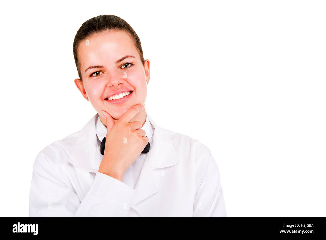 Scince woman in lab coat and bow tai smiling over white background ...