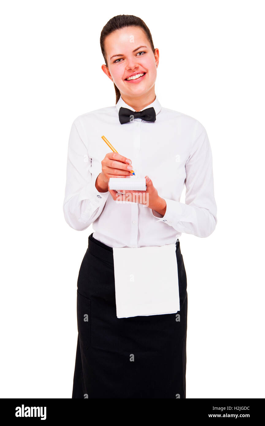 Young woman in waiter uniform writing order over white background