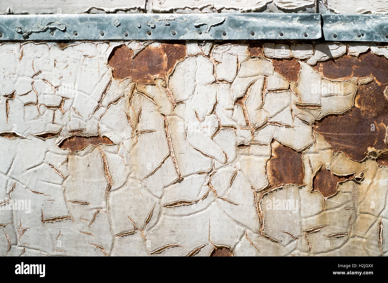 cracked painting on iron plate, background Stock Photo