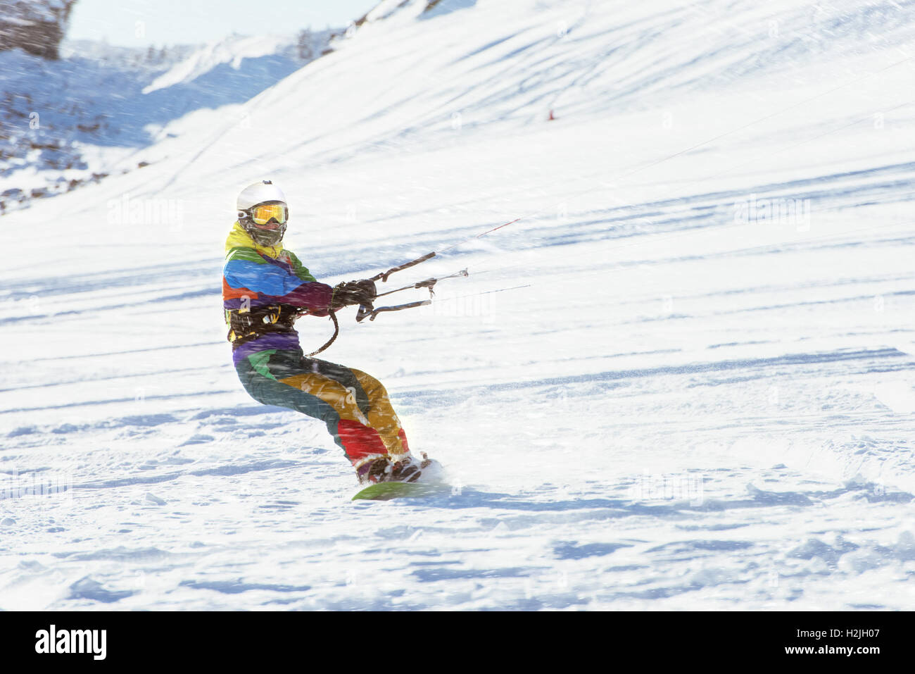 Snowboarder girl kiting snowboarding sports Stock Photo