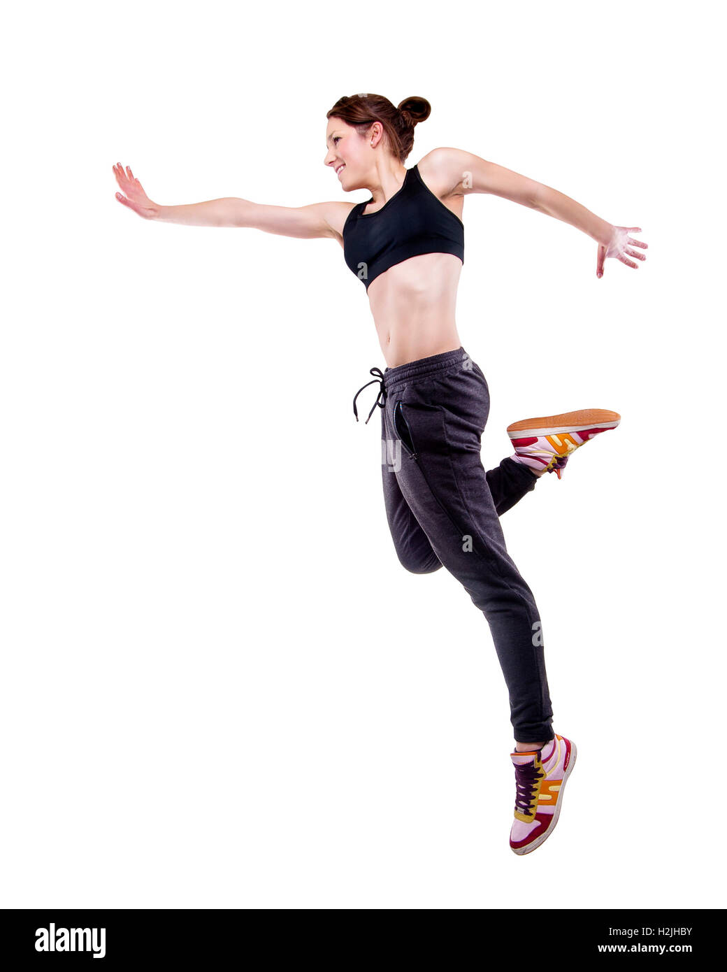 modern style dancer dence in air on studio background Stock Photo