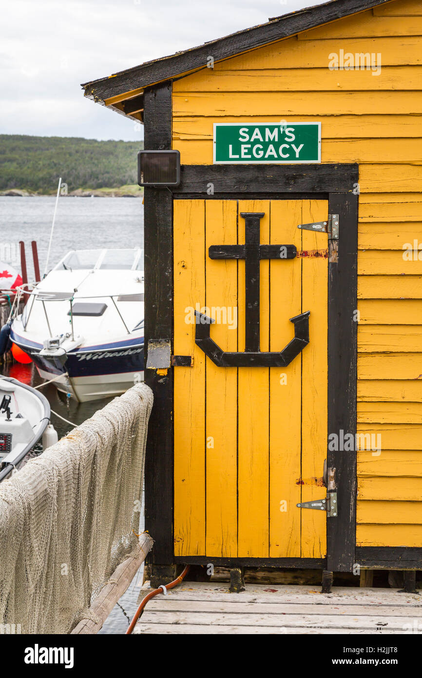 Fishing boats and colorful fishing stages in New Perlican, Newfoundland and Labrador, Canada. Stock Photo