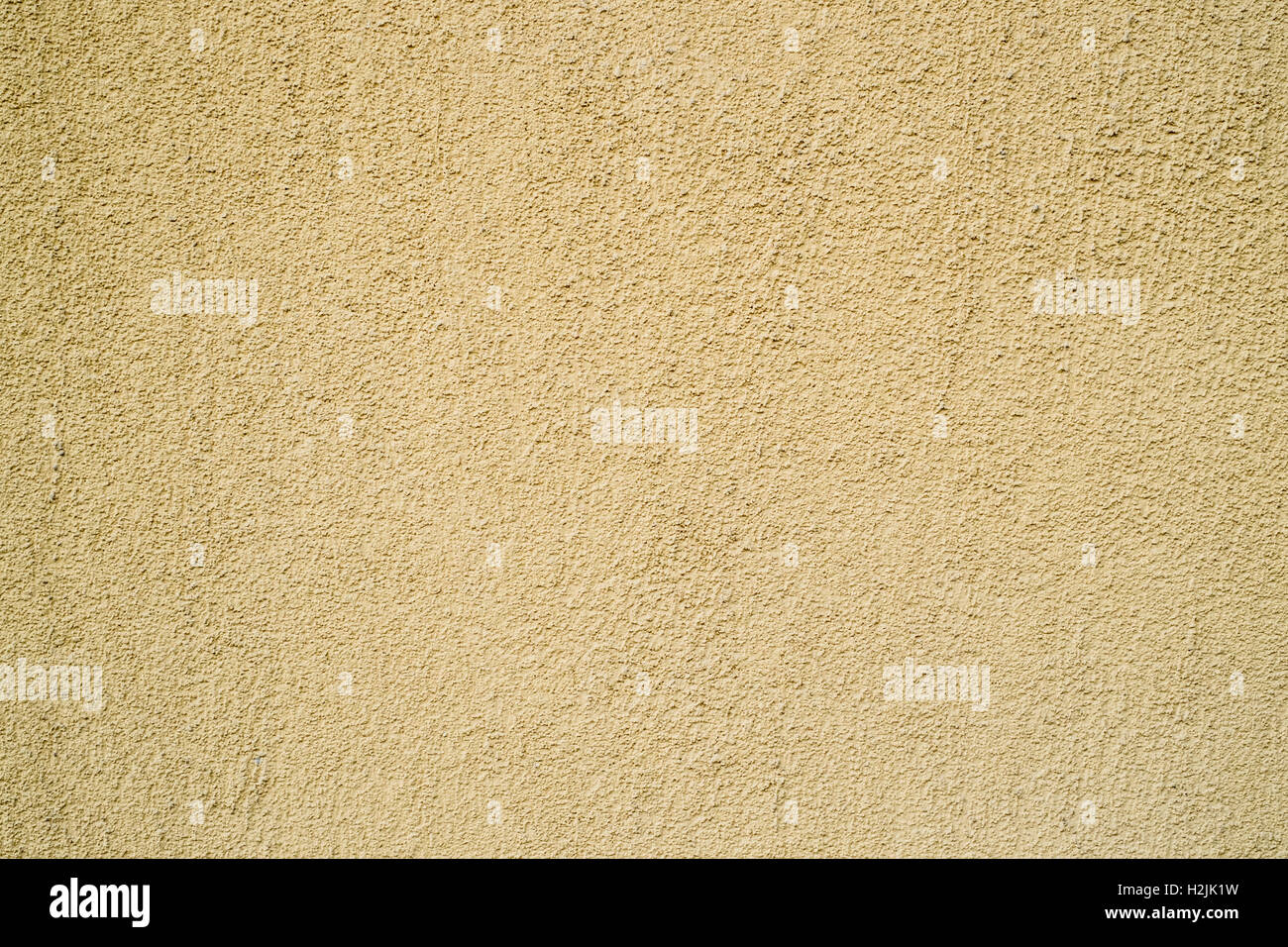 yellow plaster wall covering Stock Photo