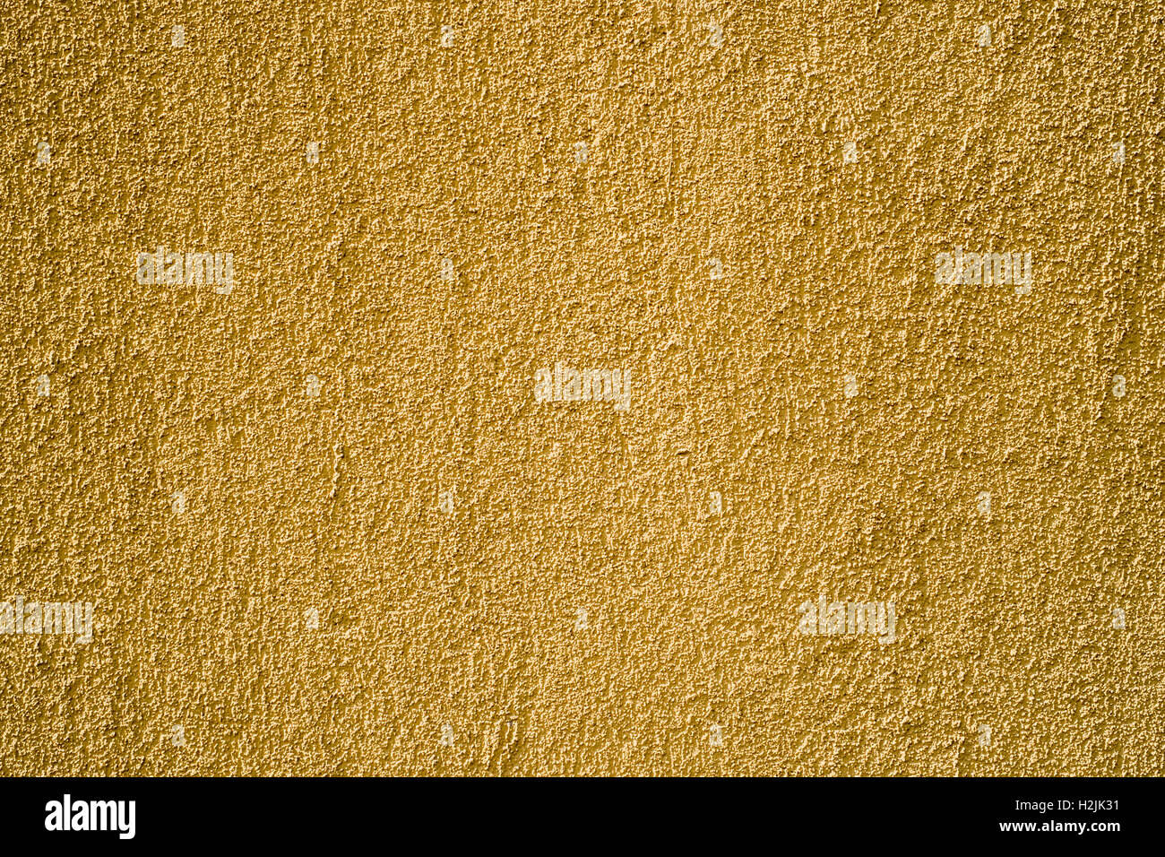 yellow plaster wall covering Stock Photo