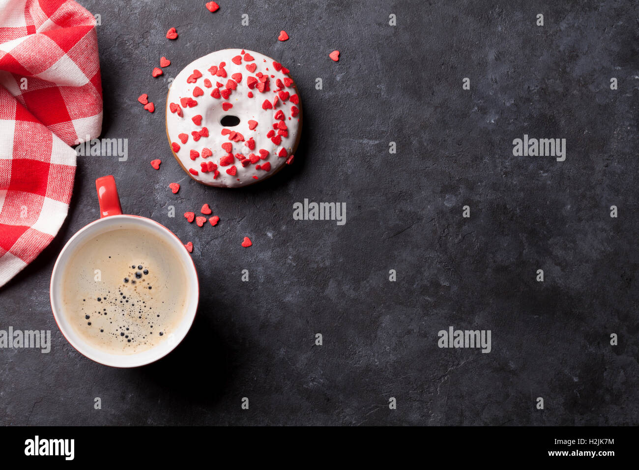 Donut and coffee on stone table. Top view with copy space Stock Photo ...