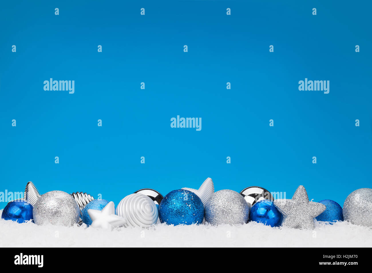 Christmas baubles decor and blue background for copy space Stock Photo ...