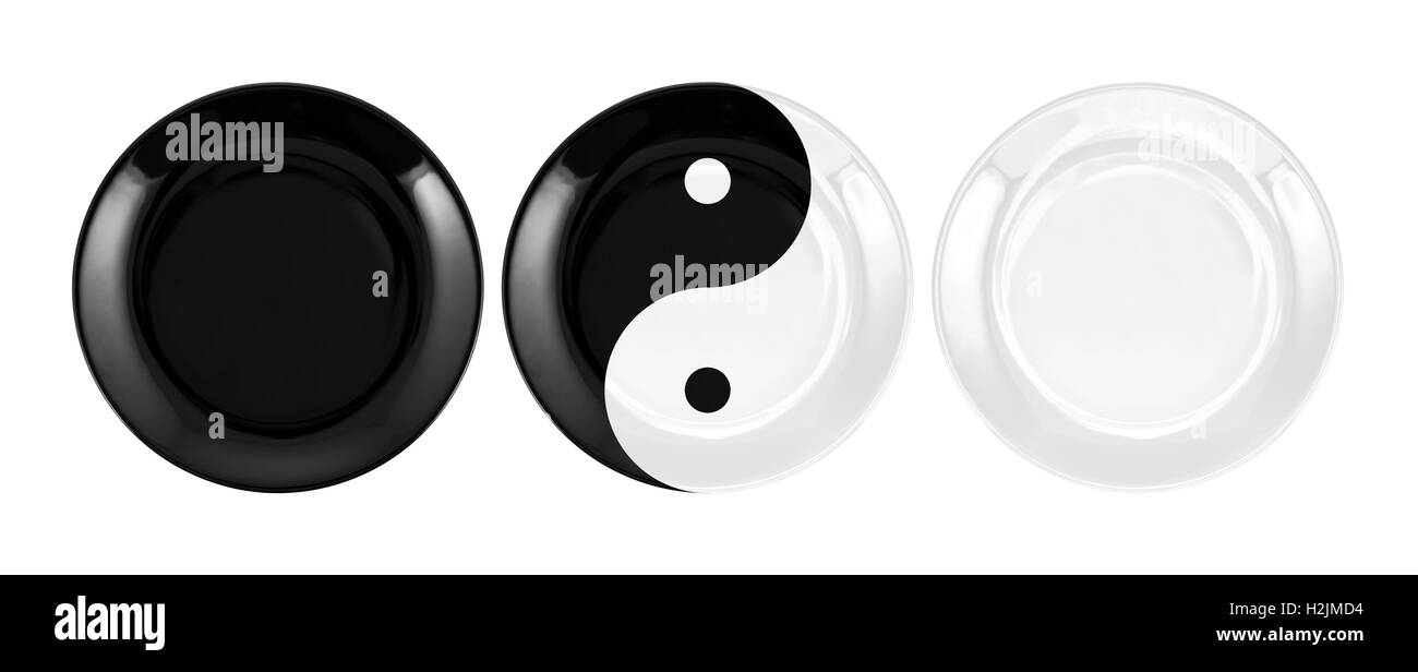 Black, white plates with yin yang symbol isolated Stock Photo