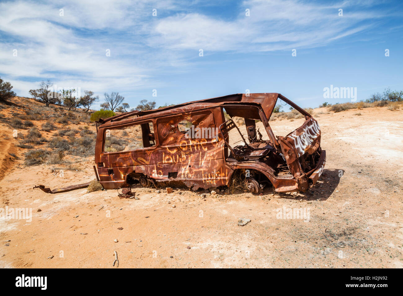 van wreck at the shores of Lake Hart, Stuart Highway, South Australia Stock Photo