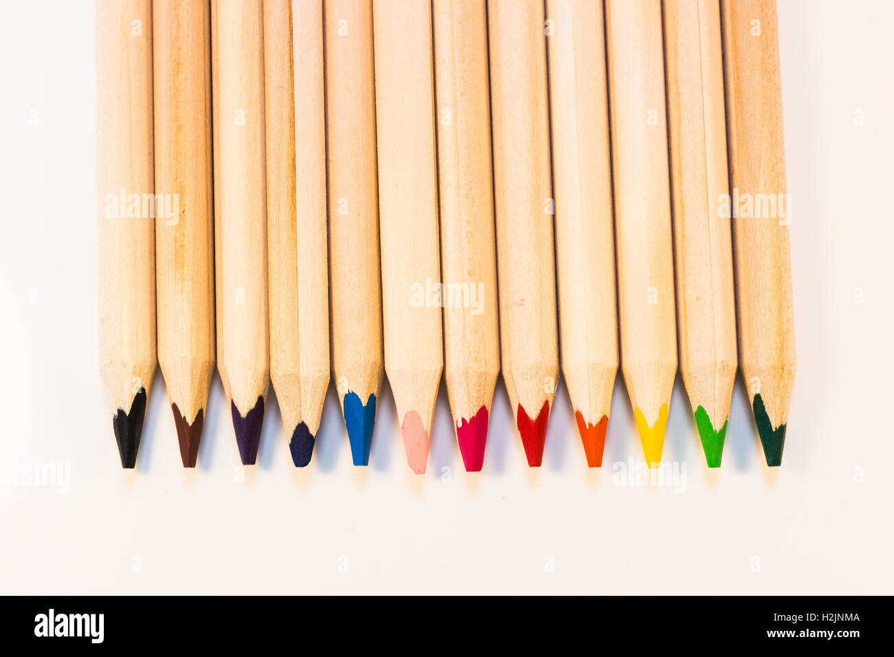 Crayons lined up Stock Photo Alamy