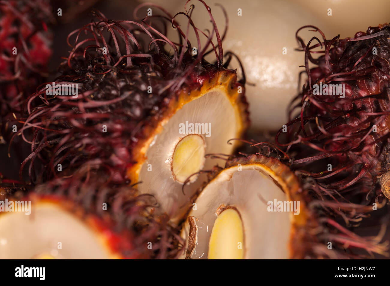 Sliced rambutan fruit. Stock Photo