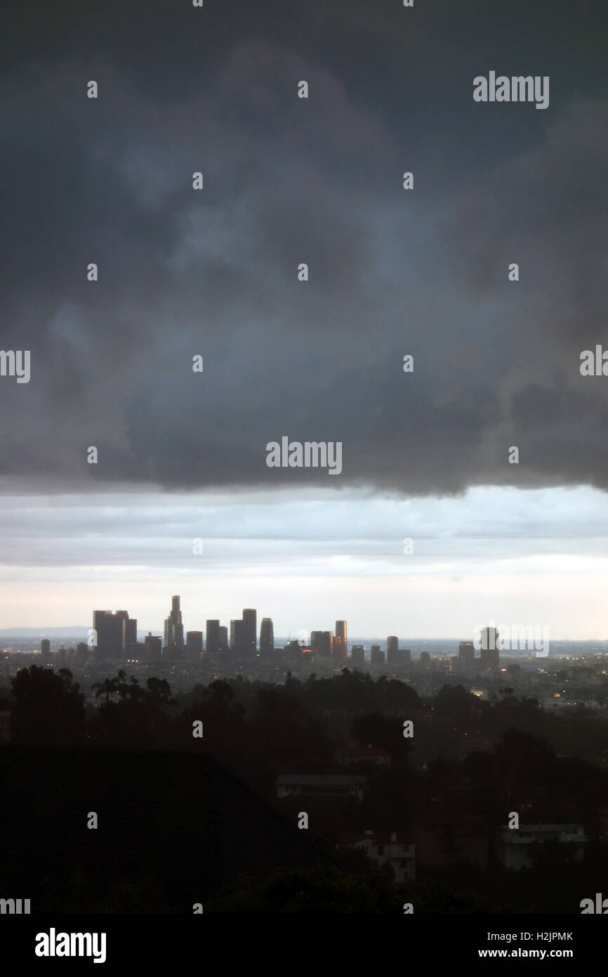 View of downtown Los Angeles skyline with cloudy skies from the Hollywood Hills Stock Photo