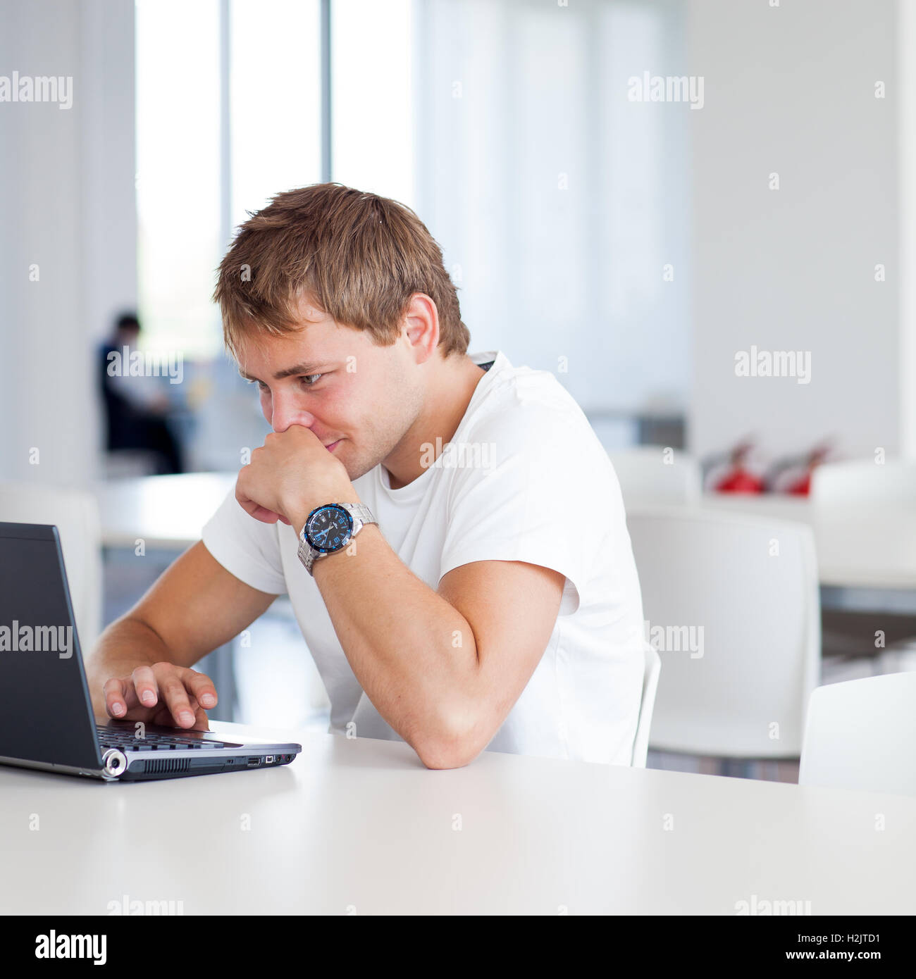 handsome college student with laptop computer Stock Photo - Alamy