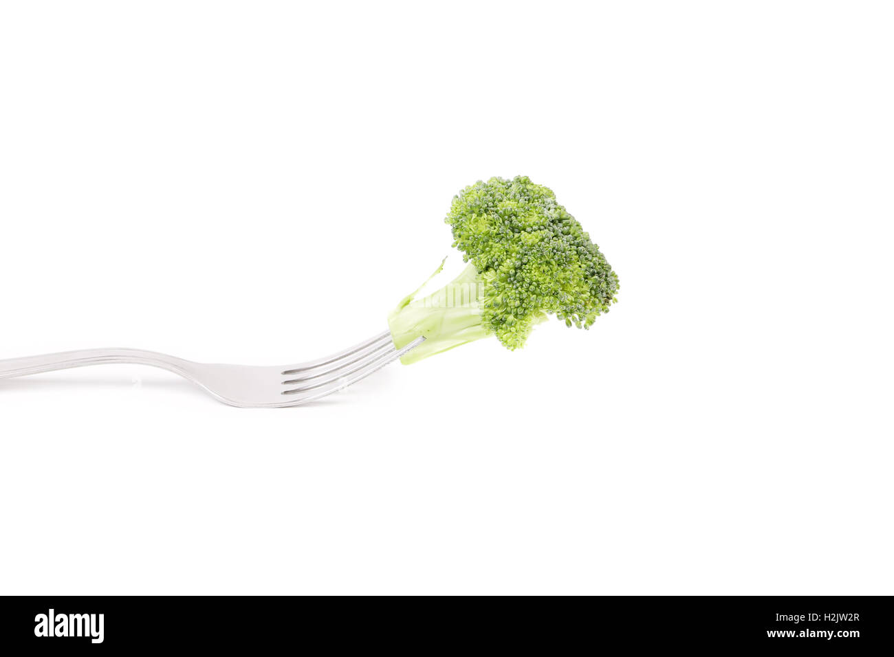 Fresh broccoli on a fork Stock Photo