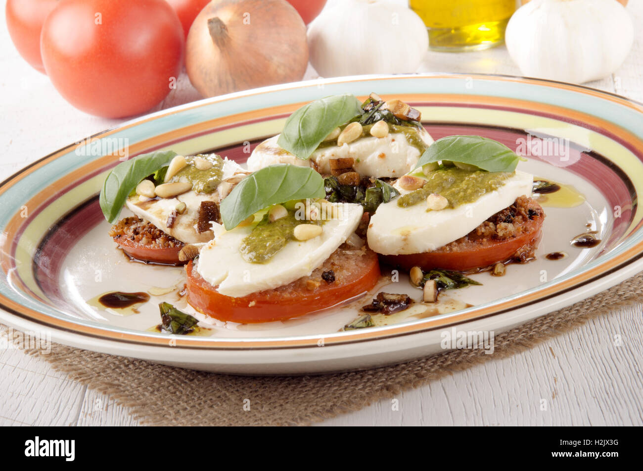 breaded tomato slices with mozzarella Stock Photo - Alamy