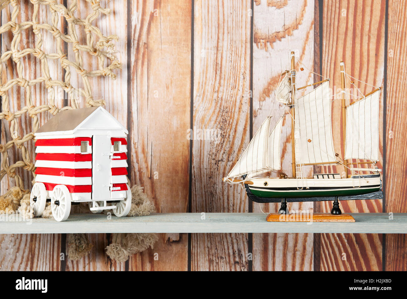 model, ship, ornament, wood, handicraft, souvenir, small, toy, detailed,  miniature, water, ocean, fishing, net, boat, collector Stock Photo - Alamy