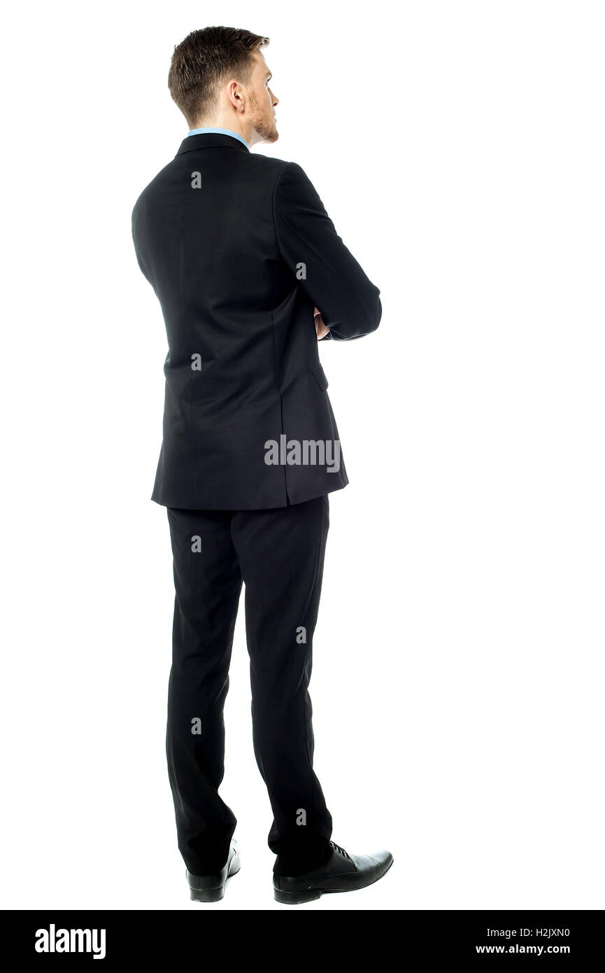 Thoughtful businessman, Rear view image Stock Photo - Alamy