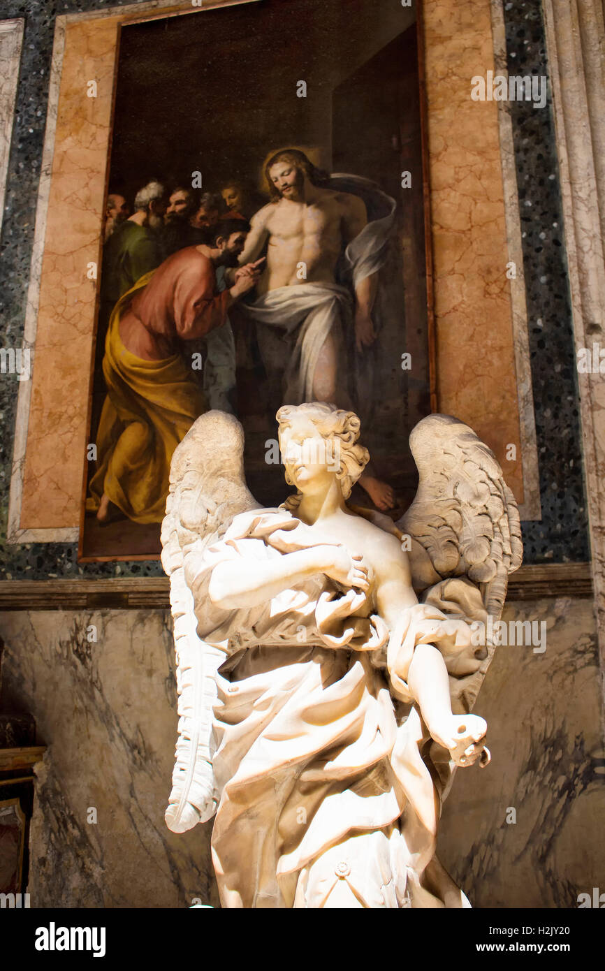 Angel statue in front of Jesus painting at inside of Pantheon in Rome. Stock Photo