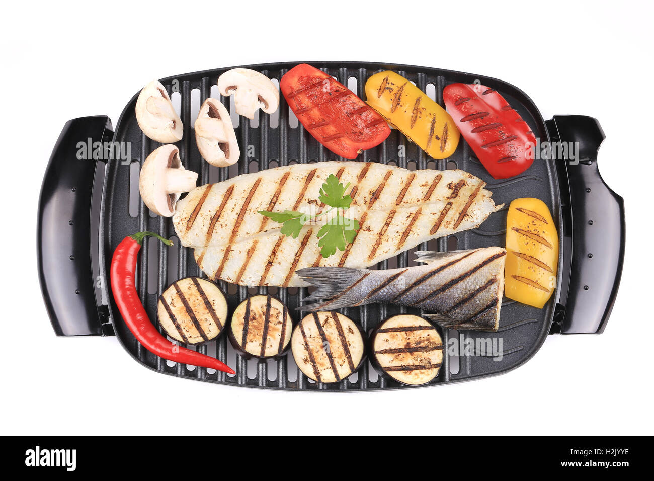 Grilled fish fillets with vegetables Stock Photo - Alamy