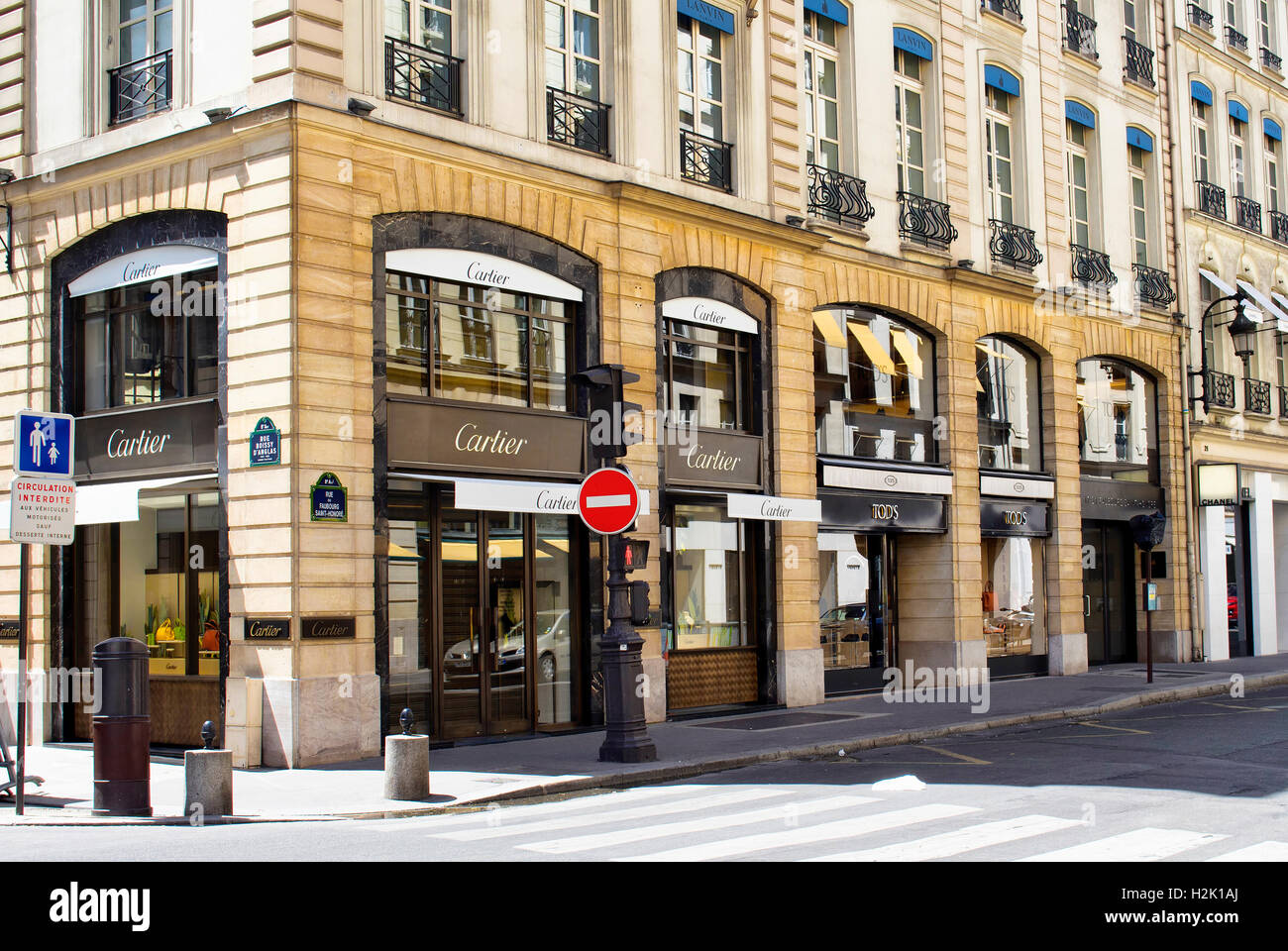 Luxury shopping street in Paris. Famous brands' shops are in the
