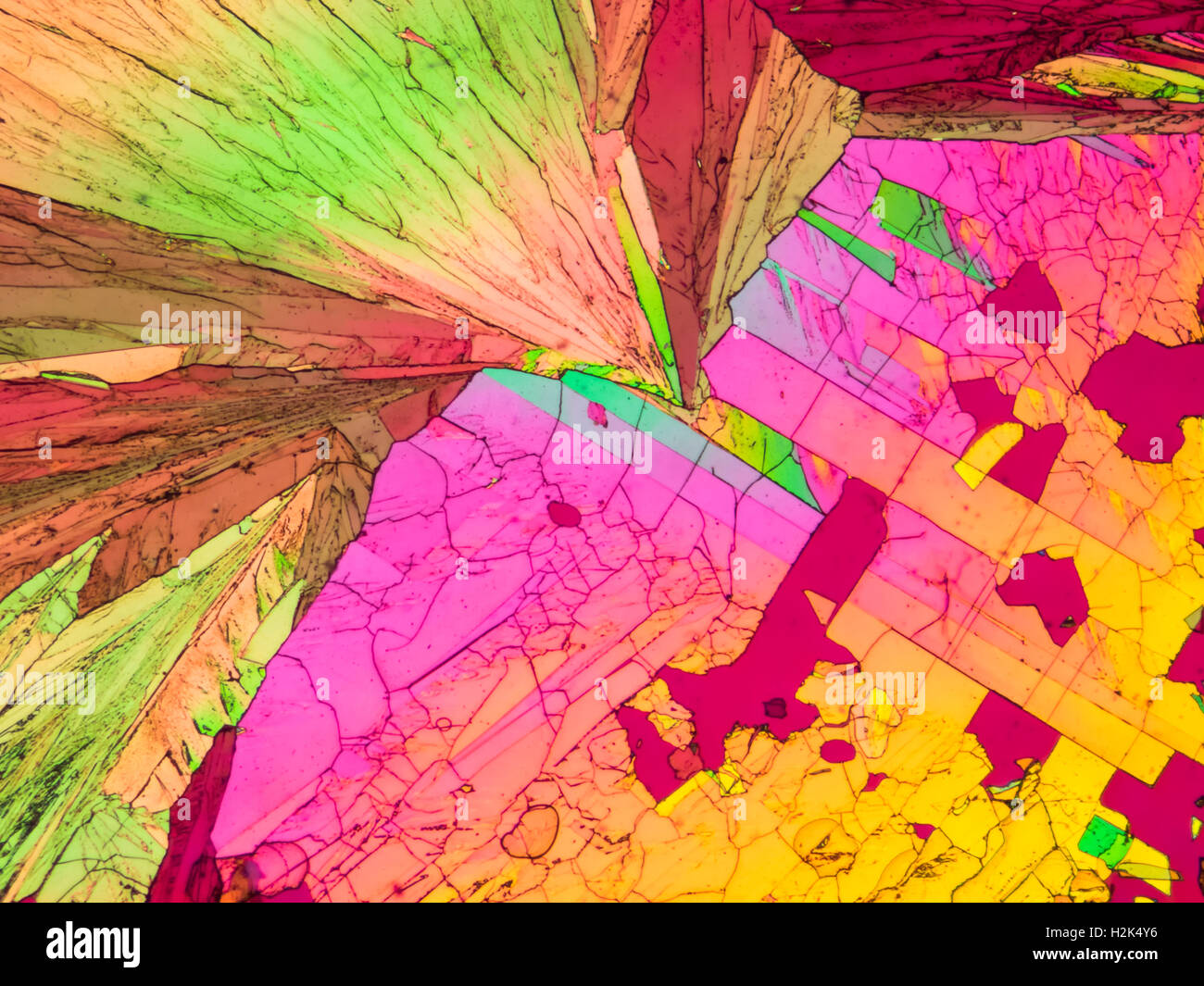 Microscopic image of  Sulfur crystals in polarized light. Stock Photo