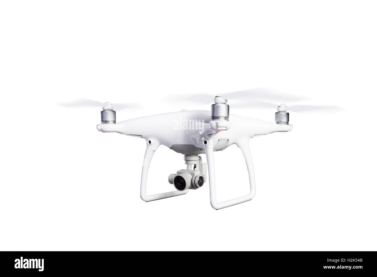 Flying helicopter drone with camera. Studio shot, isolated Stock Photo