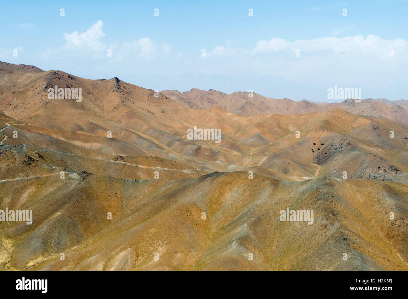 Aerial view of the sandy, barren hills around Bagram Airfield July 18, 2016 outside Kabul, Afghanistan. Stock Photo