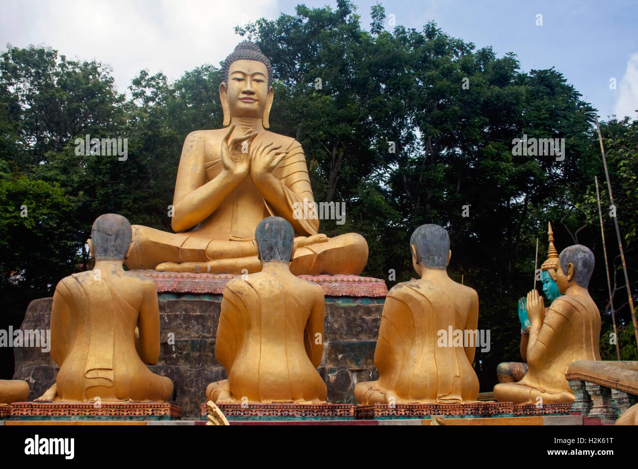 Gold Buddha statues are displayed at Phnom Pros Temple complex in Kampong Cham Province, Cambodia. Stock Photo