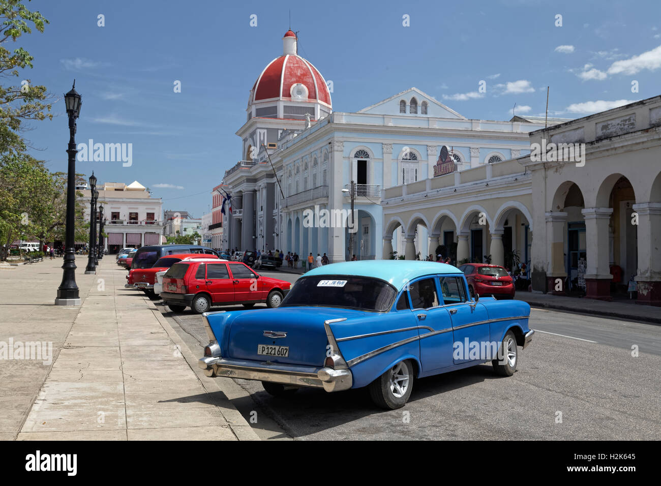 Vintage car Chevrolet Bel Air 1957 at Parque Jose Marti, in the background the town hall, historic city centre, Cienfuegos Stock Photo