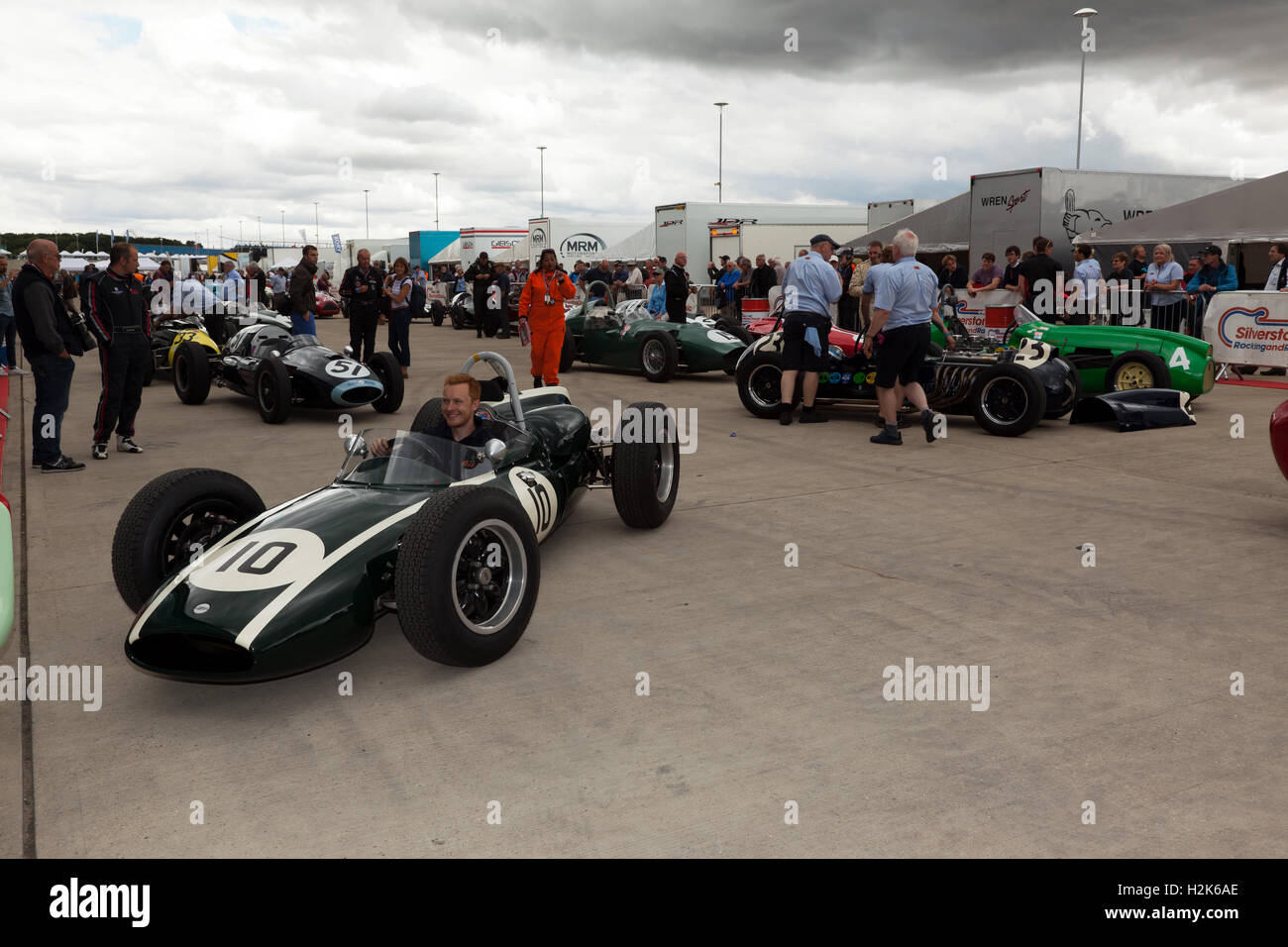 Competitors for the Maserati Trophy for HGPCA Pre '66 Grand prix Cars assemble for qualifying in the international paddock. Stock Photo