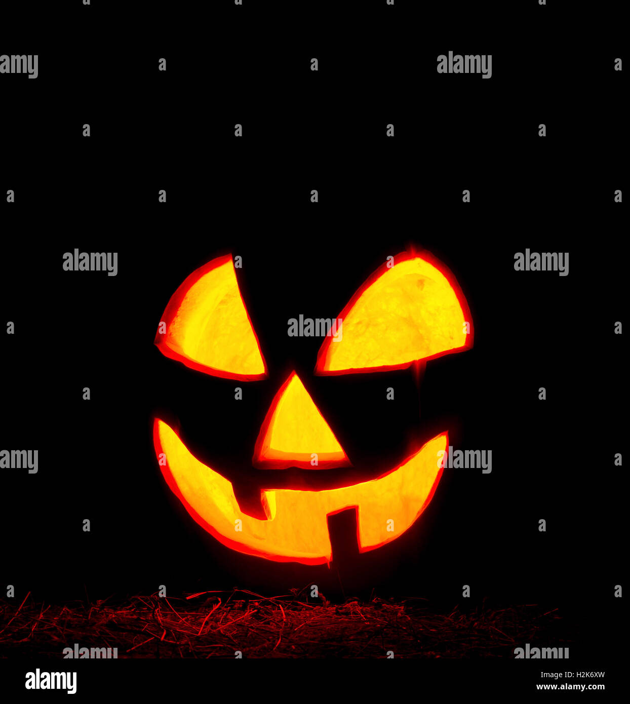 Glowing Halloween pumpkin Stock Photo