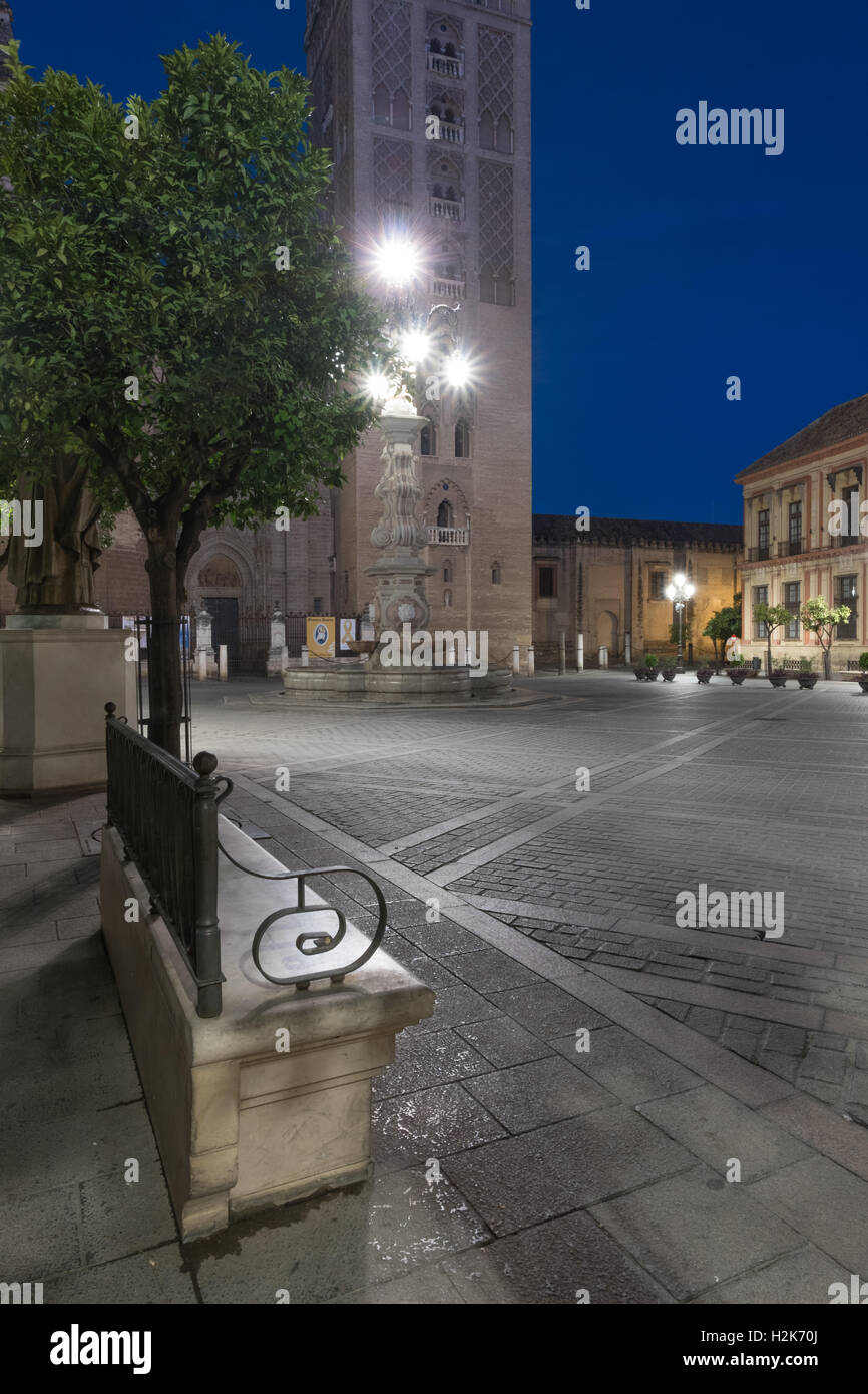 The lamp lit Cathedral square before dawn, Seville, Spain Stock Photo
