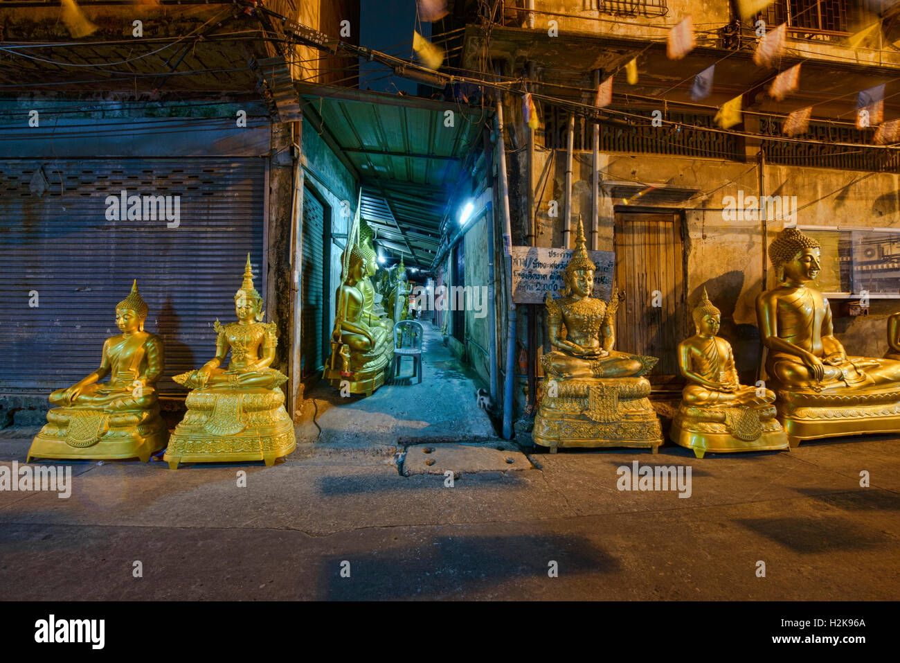 Street of Buddha statues in Bangkok, Thailand Stock Photo