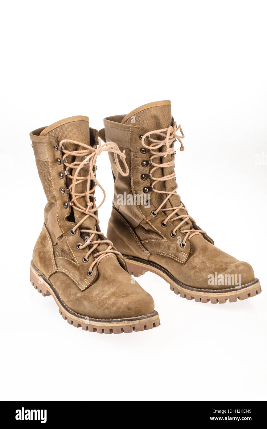 Pair of army boots on an isolated studio background Stock Photo - Alamy