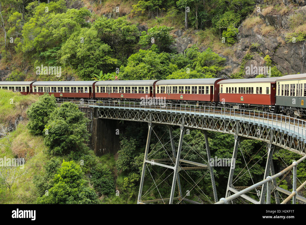 Kuranda Scenic Railway crossing an elevated bridge over Barron Gorge National Park near Cairs, Australia Stock Photo