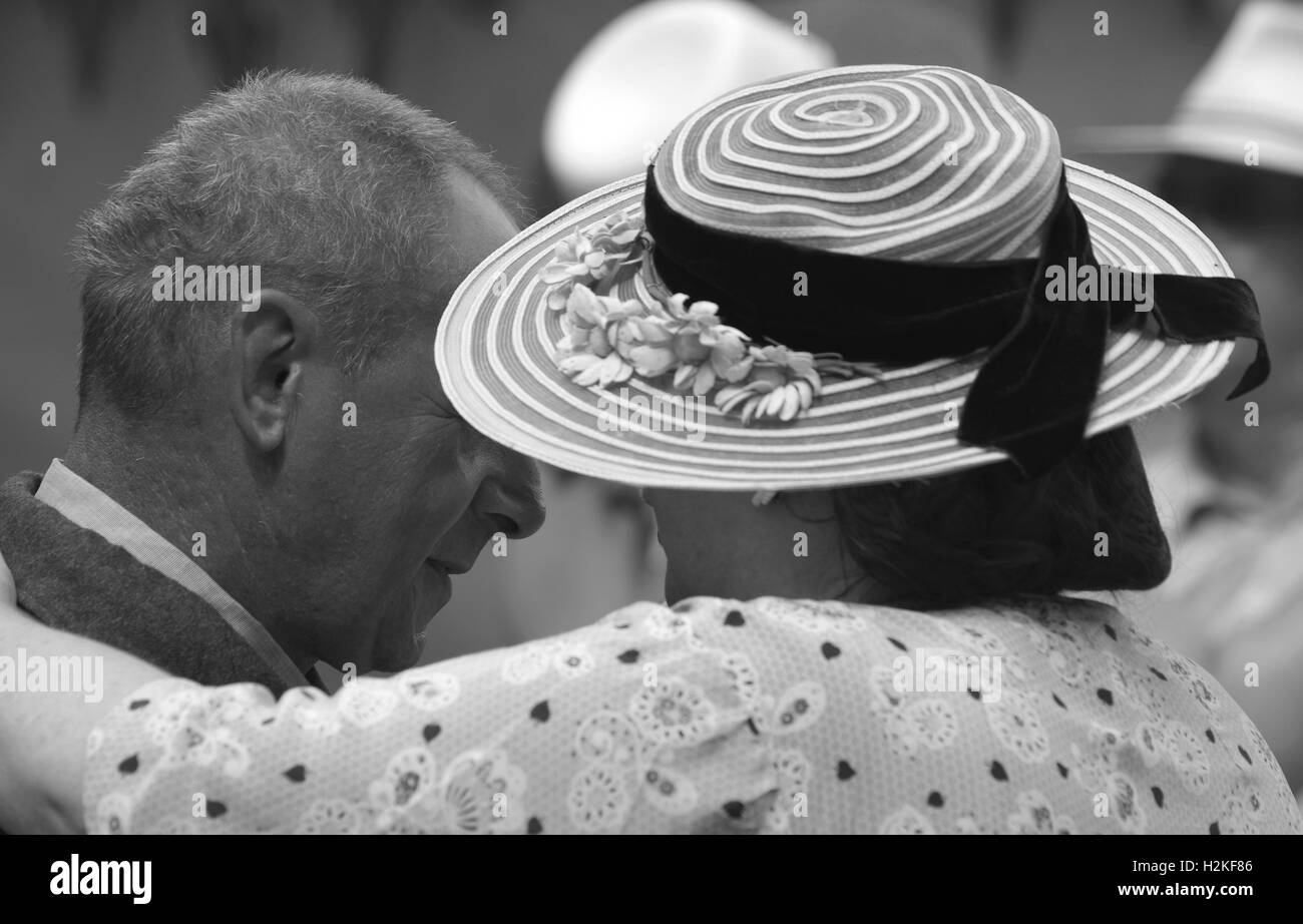 1940's old couple dancing in a embrace showing emotion and love . Stock Photo