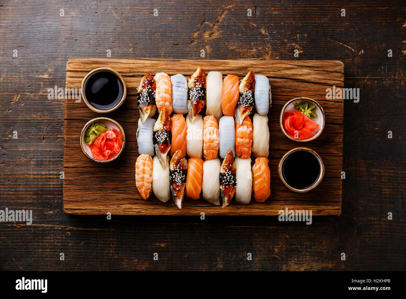Nigiri sushi set for two on wooden serving board block Stock Photo