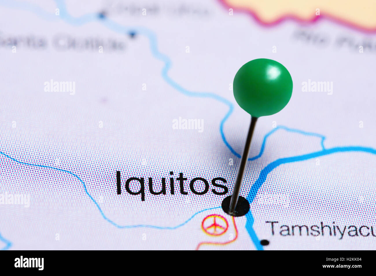 Iquitos pinned on a map of Peru Stock Photo