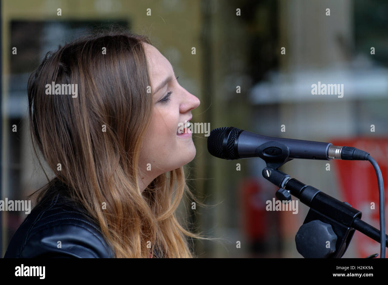 street busker performing in shopping center in england uk Stock Photo