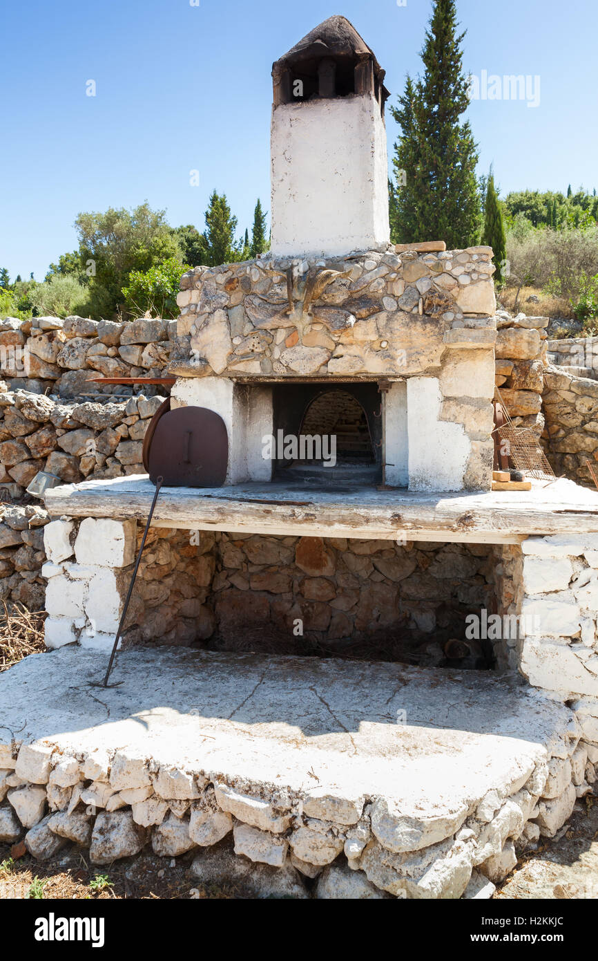 White outdoor stone oven in summer garden. Greece Stock Photo Alamy