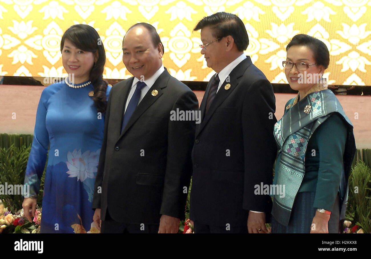 Nguyá»…n Xuan Phuc Vietnamese Prime Minister And Wife Are Greeted By The Laos Prime Minister Thongloun Sisoulith And Wife At The Association Of Southeast Asian Nations Asean Summit The Laotian Capital Vientiane