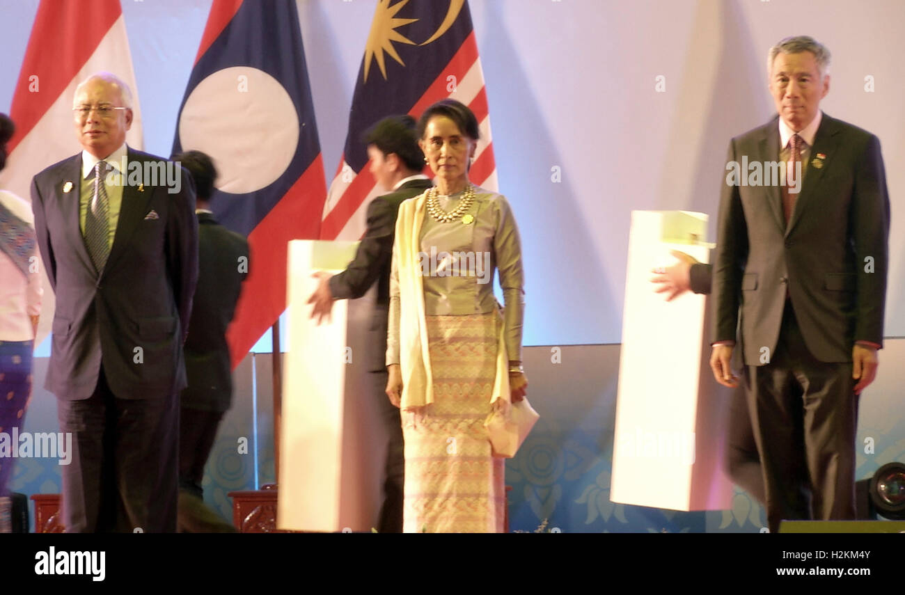 Najib Razak, Aung San Suu Kyi and Lee Hsien Loong attend the opening ceremonies at the Association of Southeast Asian Nations (ASEAN) summit the Laotian capital Vientiane. Stock Photo