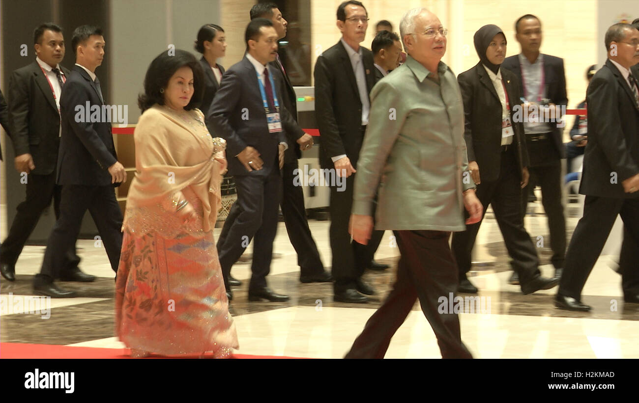 Najib Razak, PM of Malaysia and wife arrive at the Association of Southeast Asian Nations (ASEAN) summit the Laotian capital Vientiane. Stock Photo