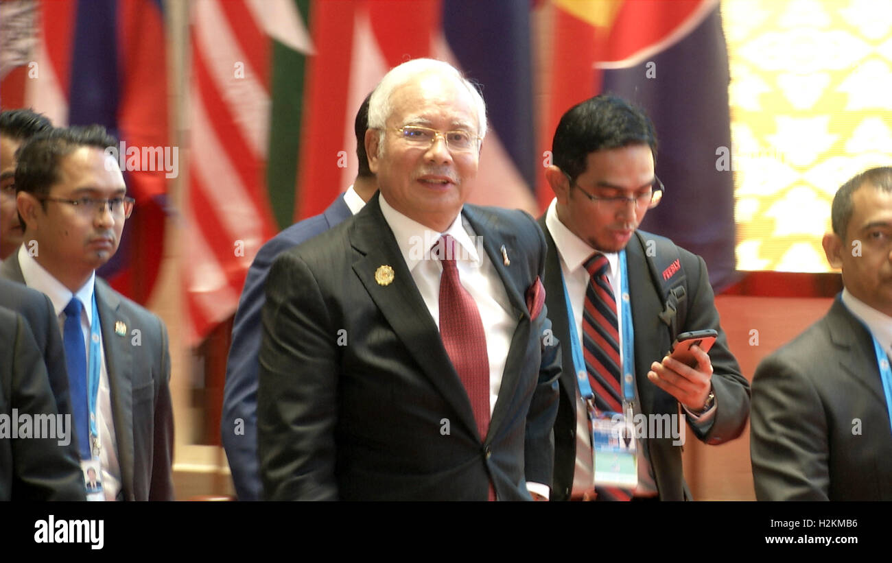 Najib Razak, PM of Malaysia walks to a meeting during the Association of Southeast Asian Nations (ASEAN) summit the Laotian capital Vientiane. Stock Photo