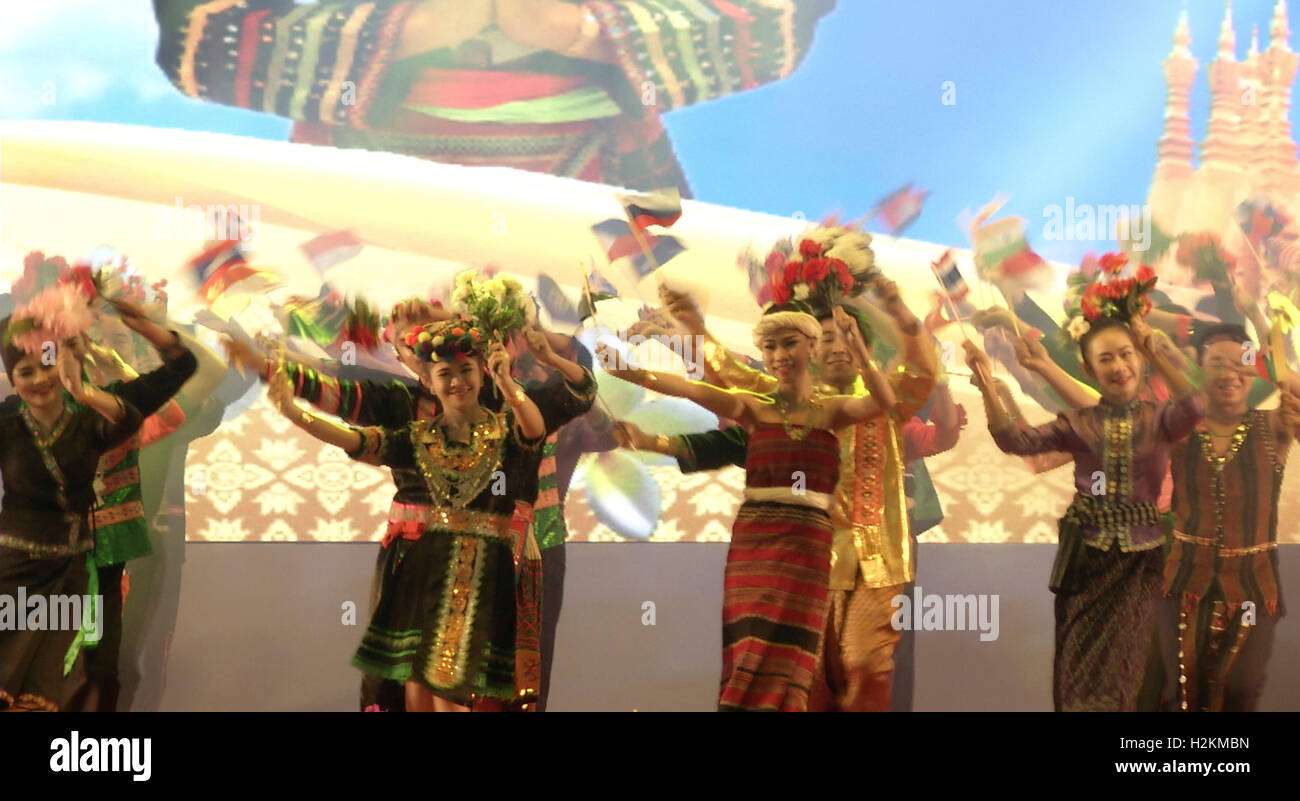Dancers perform in a dinner event at the Association of Southeast Asian Nations (ASEAN) summit the Laotian capital Vientiane. Stock Photo