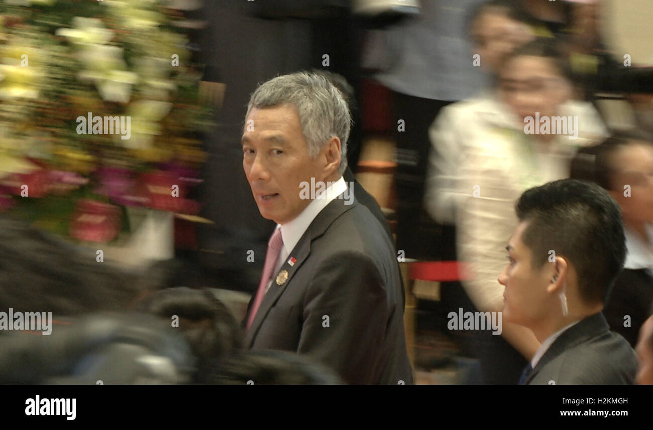 Lee Hsien Loong, Singapore PM walks to a meeting during the Association of Southeast Asian Nations (ASEAN) summit the Laotian capital Vientiane. Stock Photo