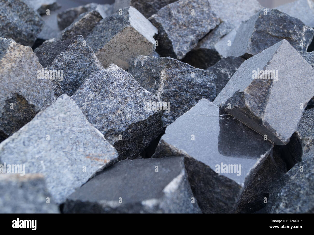 Pile of gray cube granite stones, texture Stock Photo