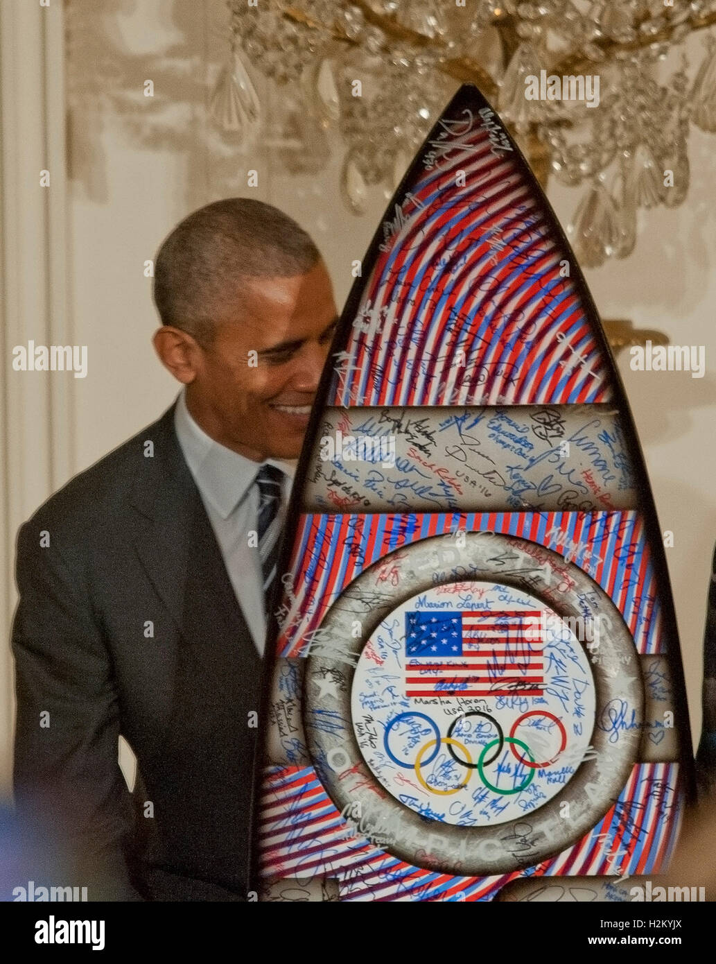 Washington DC, September 29, 2016, USA:  President Barack Obama welcomes the 2016 Summer Olympic Team to the White House and leans against a surfboard signed by the entire 2016 US Olympic team.  Patsy Lynch/MediaPunch Stock Photo