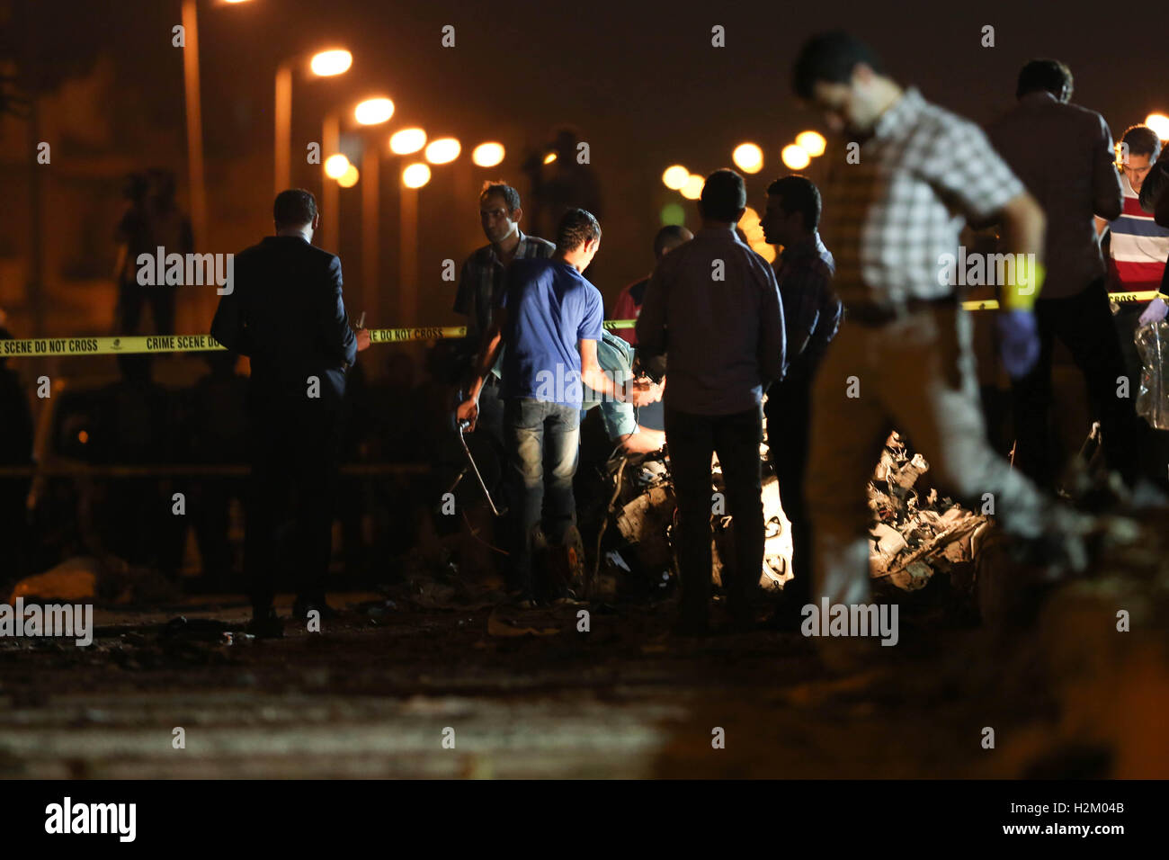 Cairo. 29th Sep, 2016. Egyptian security forces inspect the blast scene