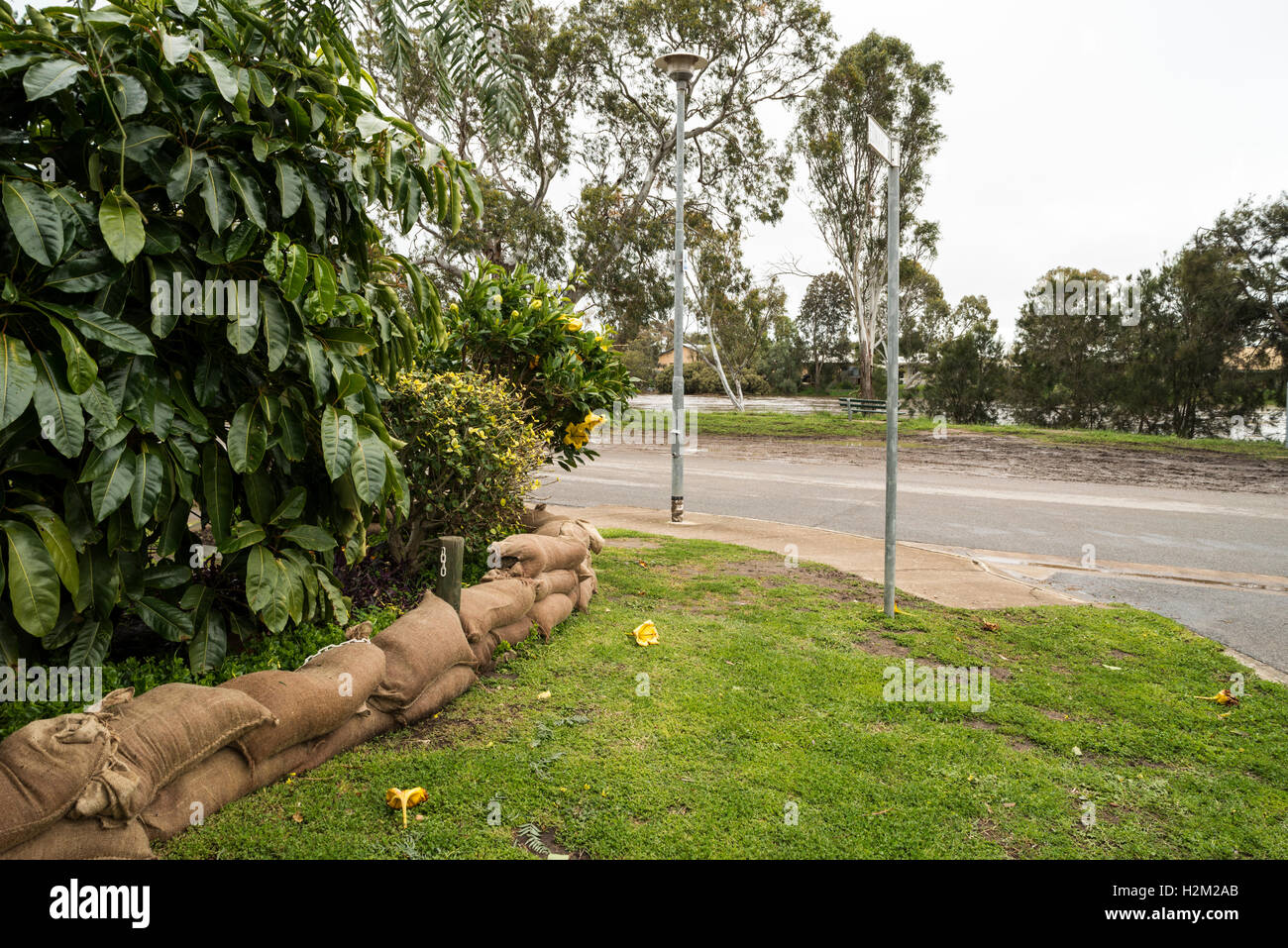Old Noarlunga, South Australia. 30th September, 2016. Homes and properties near the swollen Onkaparinga River are sandbagged as the biggest storm in fifty years hits South Australia knocking out power and flooding many areas. Credit:  Raymond Warren/Alamy Live News Stock Photo