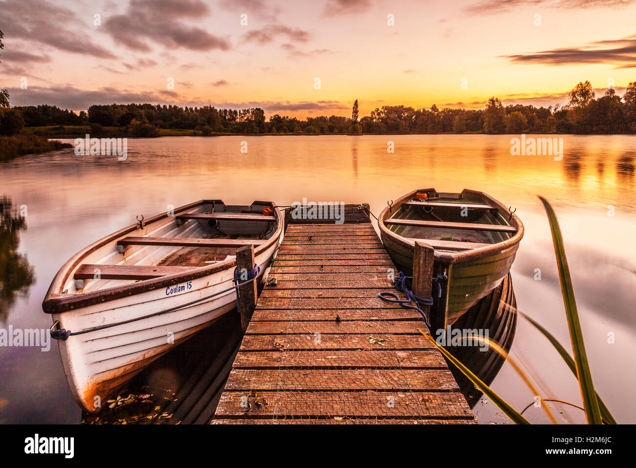 Late summer sunrise on one of the lakes at Cotswold Water Park Stock Photo